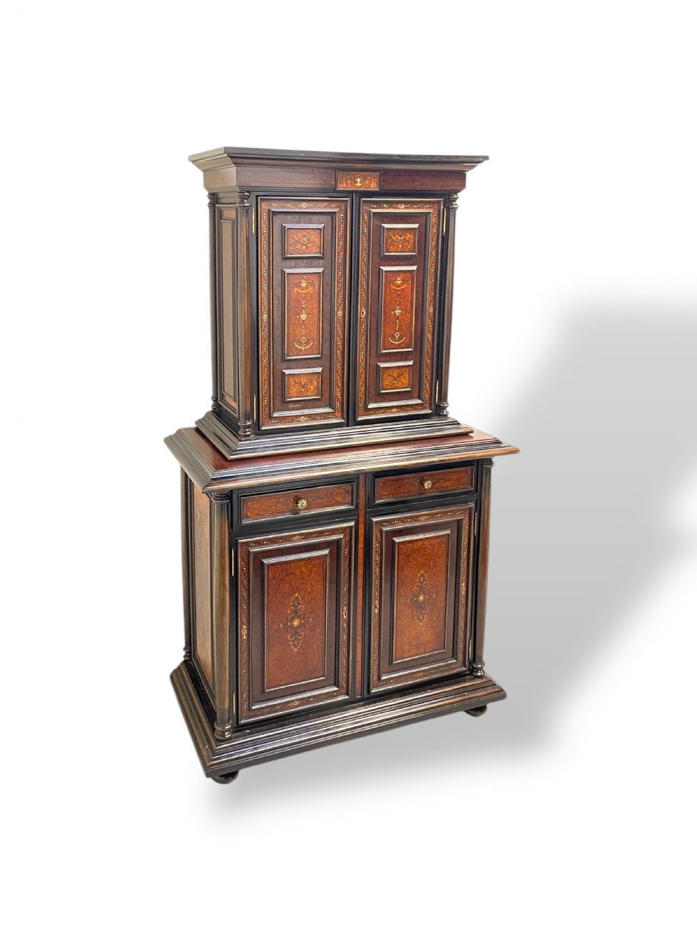 A two-part dark walnut Spanish buffet cabinet featuring detailed marquetry and bone inlay across four panelled cupboard doors and two upper drawers. View II