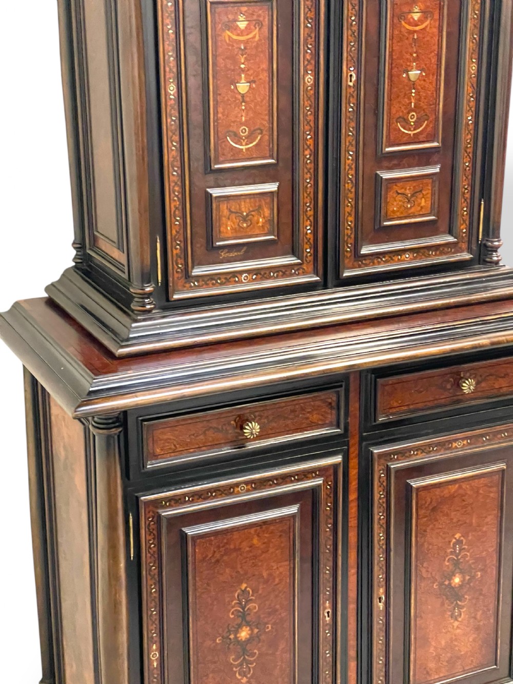 A two-part dark walnut Spanish buffet cabinet featuring detailed marquetry and bone inlay across four panelled cupboard doors and two upper drawers. View VI