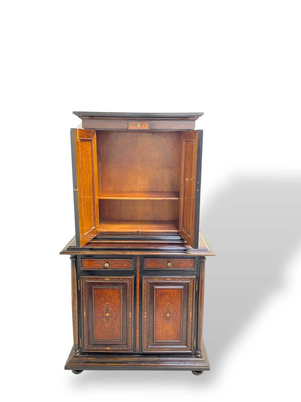 A two-part dark walnut Spanish buffet cabinet featuring detailed marquetry and bone inlay across four panelled cupboard doors and two upper drawers. View IX