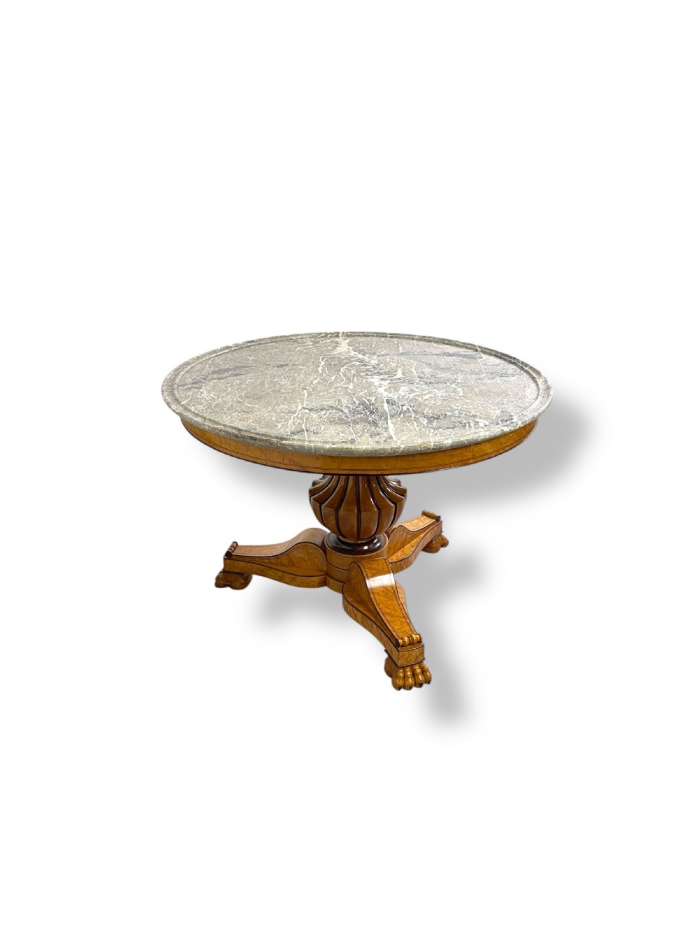 A circular antique French Empire gueridon table featuring a grey-veined marble top on a carved wooden pedestal with a triform base and lion paw feet. View XI