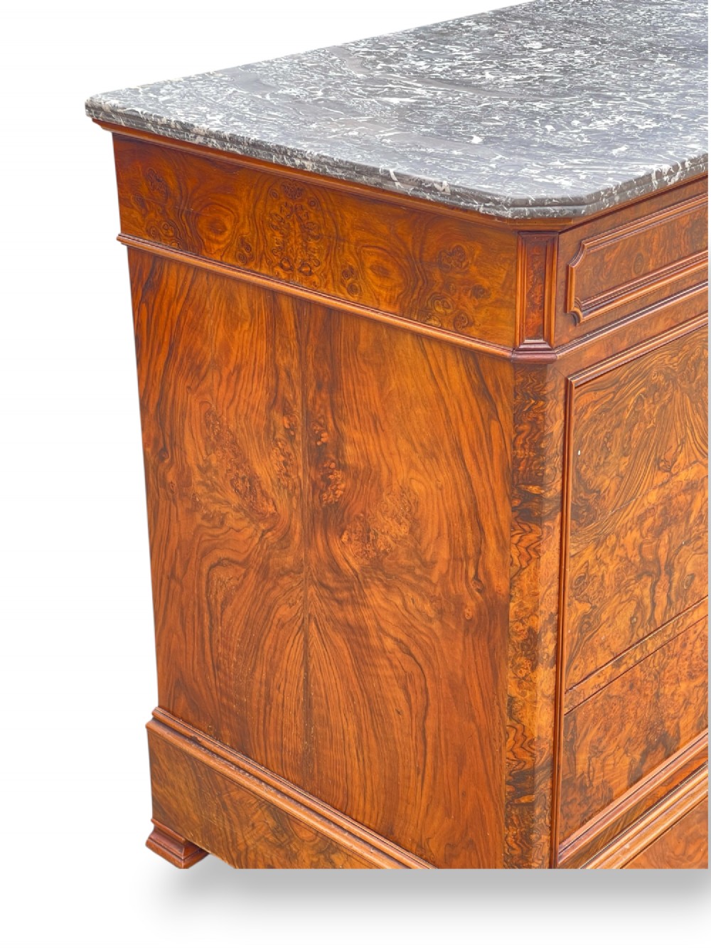 A 19th-century French Louis Philippe walnut commode featuring a grey marble top surface and figured walnut timber drawers with brass keyhole escutcheons. View VII