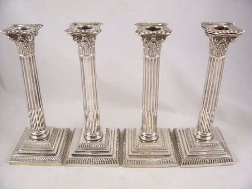 Set of Four Silver Candlesticks