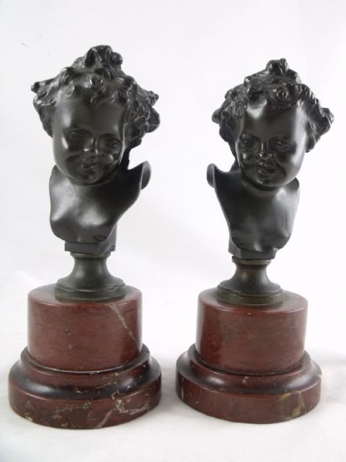 Pair of Bronze Busts of Children