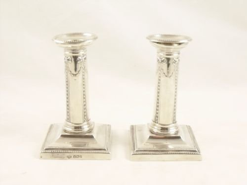 A Pair of Silver Candlesticks
