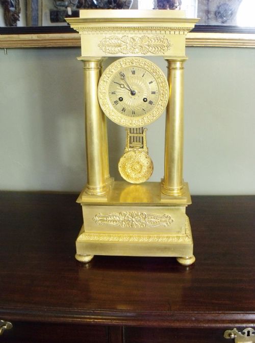 fig 1. 19TH C GILT ORMOLU PORTICO CLOCK