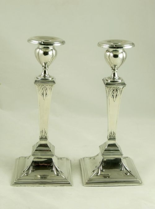 Pair of Adams Style Silver Candlesticks