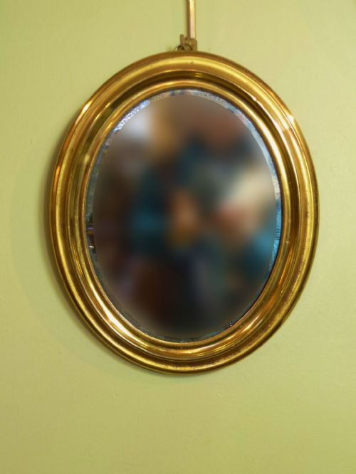 Oval Gilt Brass Wall Mirror