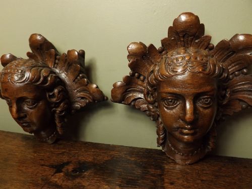 Pair Carved Wood Heads