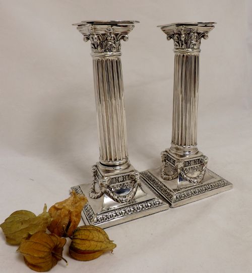 Pair of Corinthian Candle Sticks