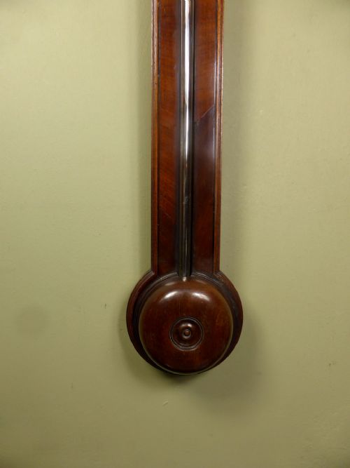 fig 1. A GEORGE III MAHOGANY STICK BAROMETER