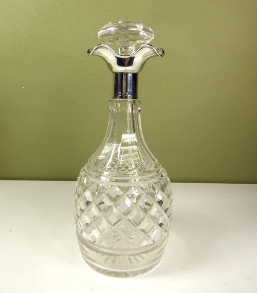 A Silver Mounted Cut Glass Decanter