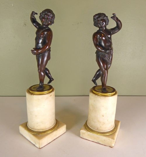 Pair of Regency Bronze Cherubs on Marble Bases
