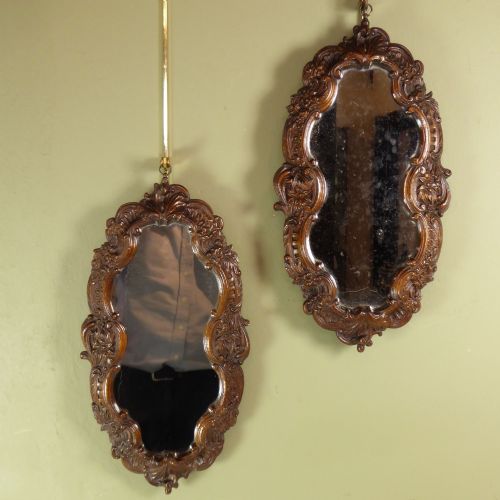Pair of Carved Walnut Mirrors