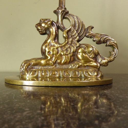 fig 1. 19TH C BRASS GRIFFIN DOOR PORTER