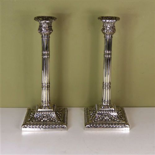 A Pair of George III Candle Sticks