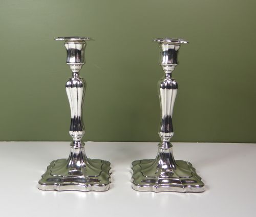 A Pair of Silver Candlesticks