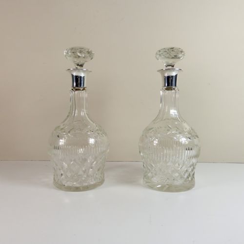 Pair of Cut Glass Decanters with Silver Collars