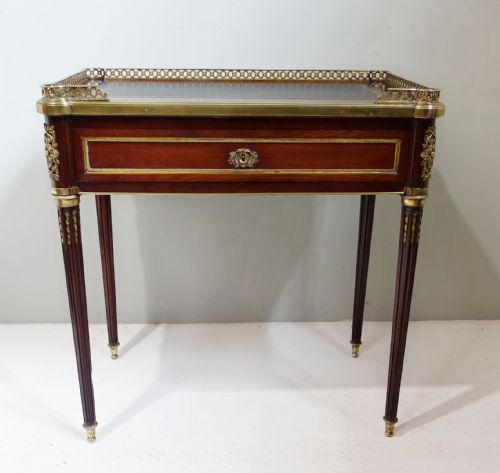 fig 1. 19TH C MAHOGANY AND BRASS MOUNTED WRITING TABLE