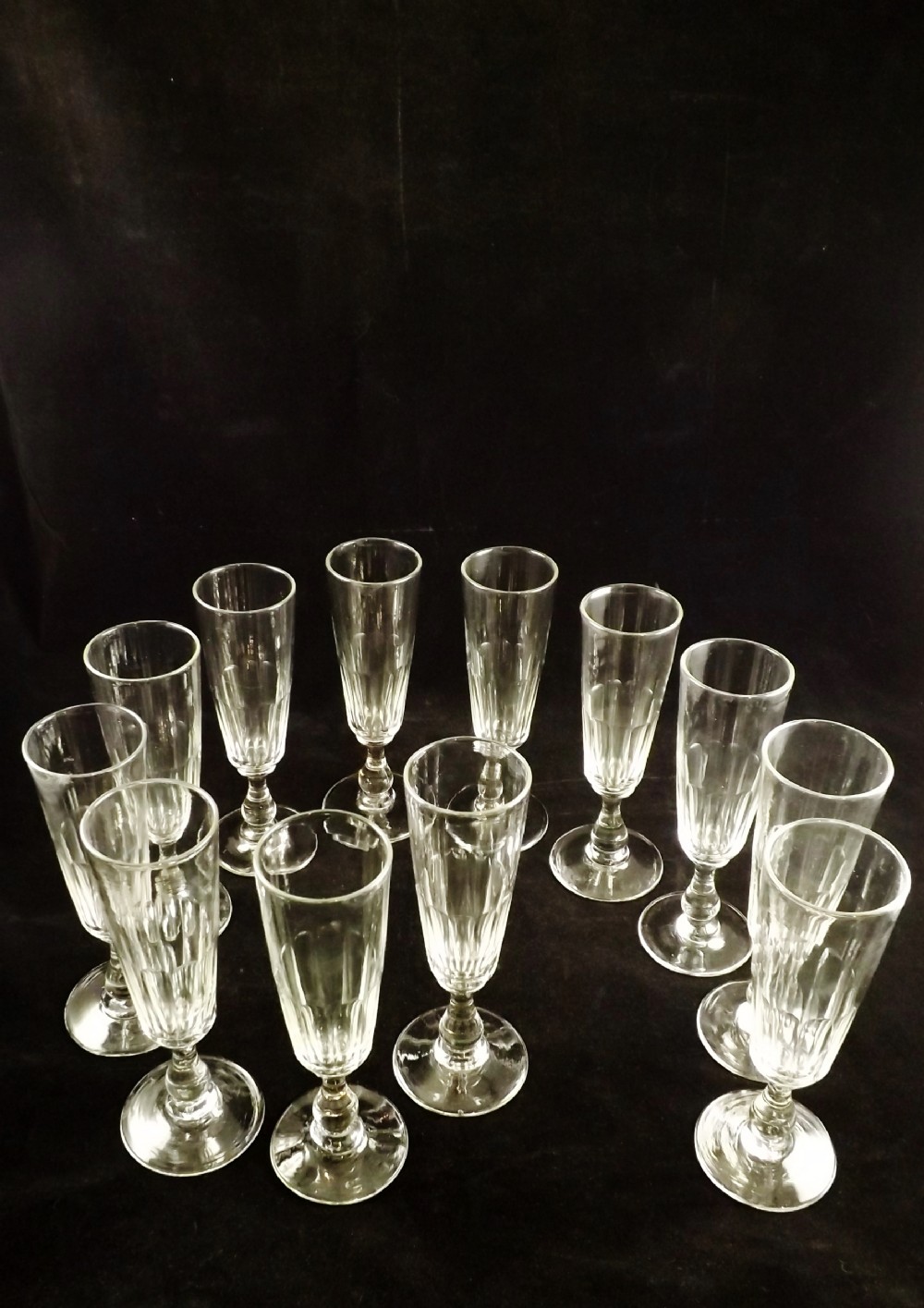 SET OF TWELVE 19TH C CHAMPAGNE FLUTES