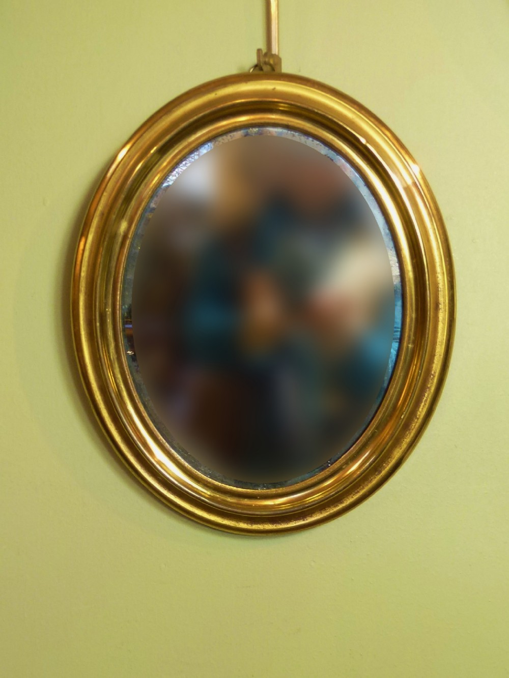 OVAL GILT BRASS WALL MIRROR