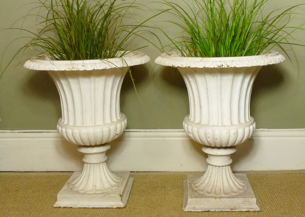 PAIR 19TH C CAST IRON GARDEN URNS