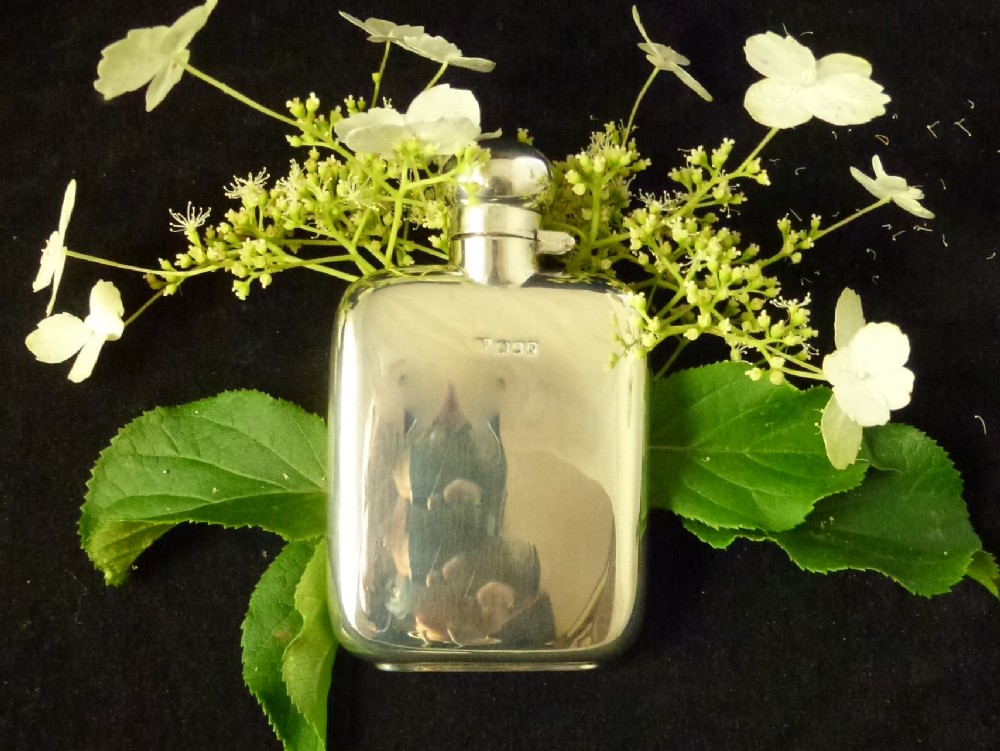 ANTIQUE SILVER HIP FLASK