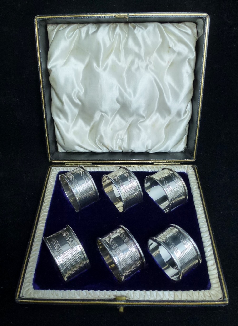 Set of silver napkin rings