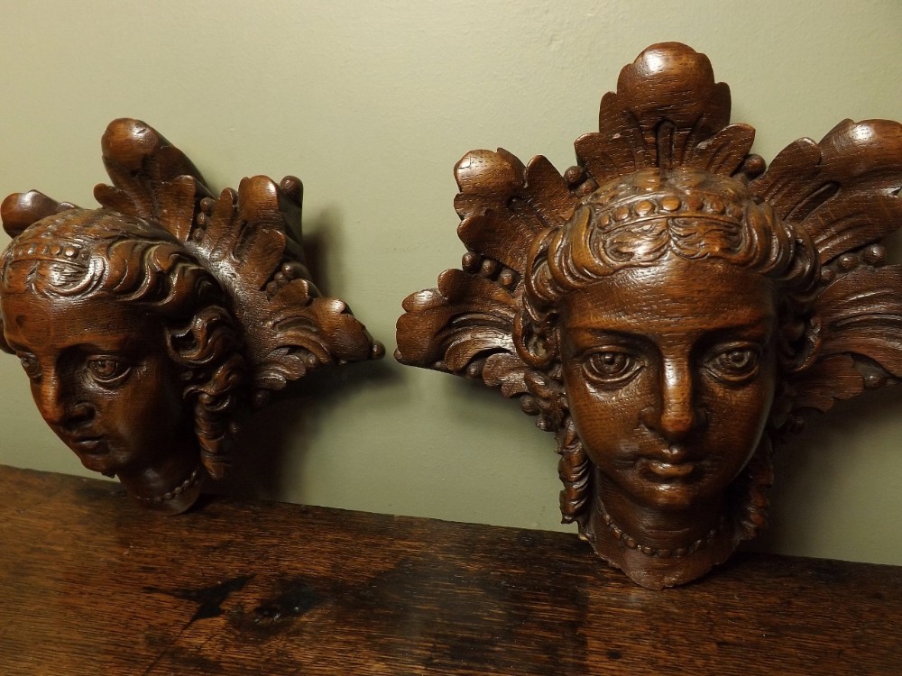PAIR CARVED WOOD HEADS
