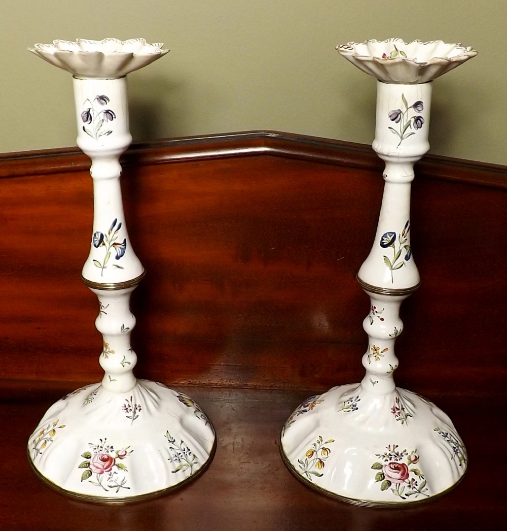 Pair of Bilston enamel candle sticks