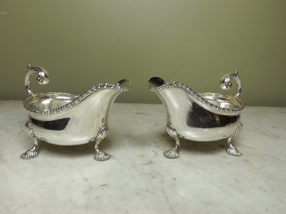 PAIR OF ANTIQUE SILVER SAUCE BOATS