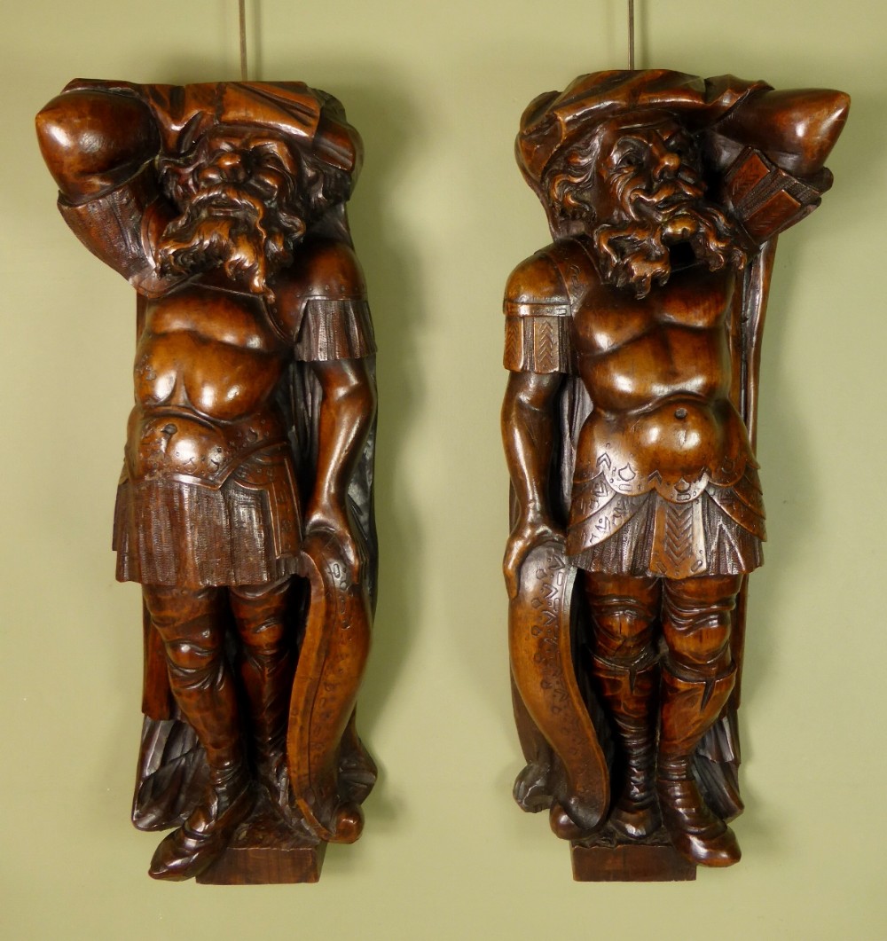 Pair of early 19th C carved walnut figures