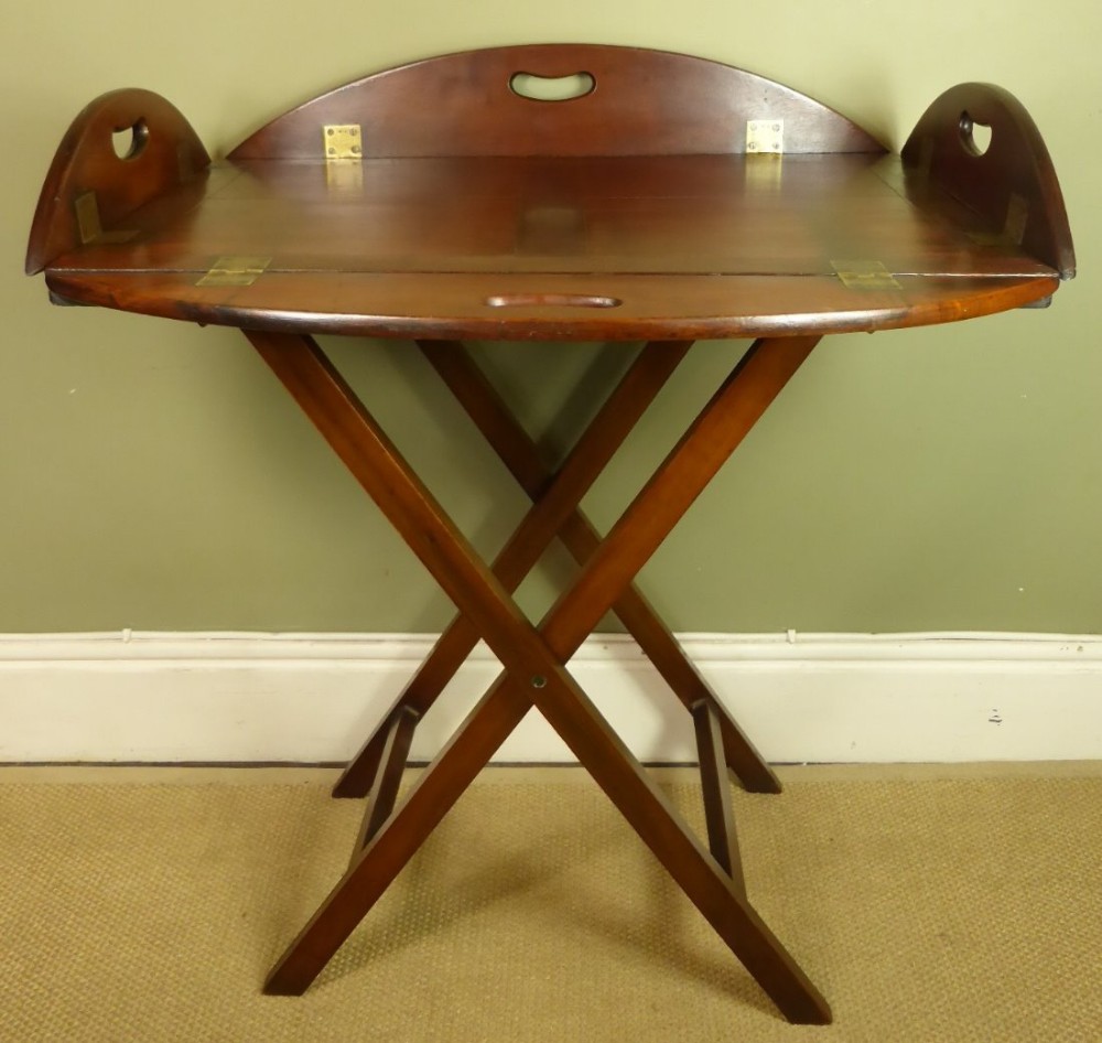 A GEORGE III MAHOGANY BUTLERS TRAY AND STAND