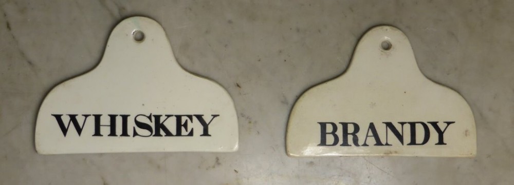 A PAIR OF 19TH C. WINE BIN LABELS