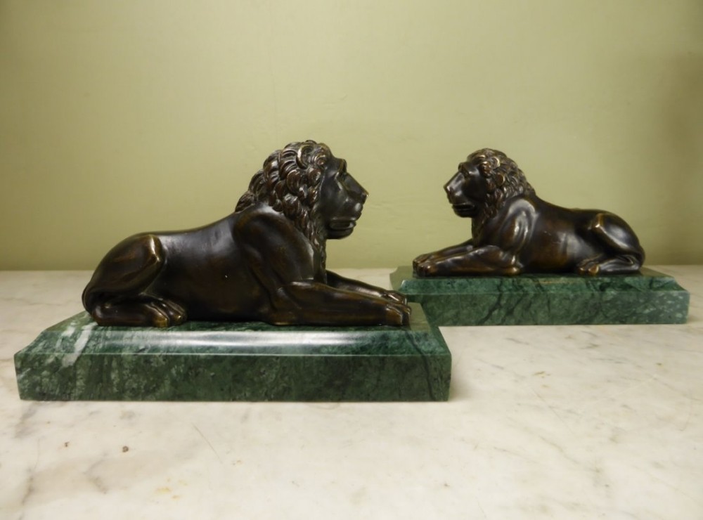 PAIR OF REGENCY BRONZE LIONS