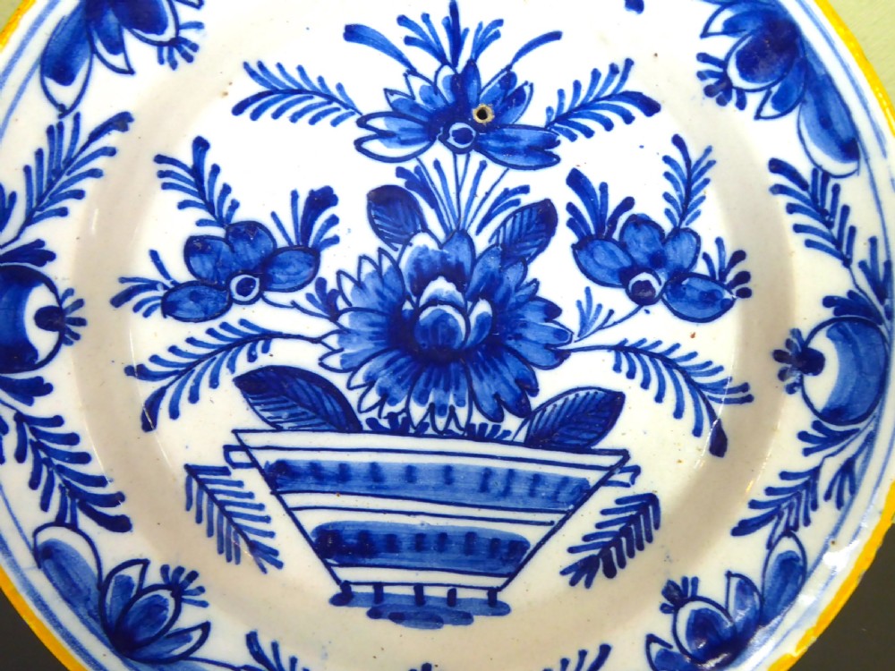 A SET OF FOUR LATE 18TH C DELFT DISHES  View V