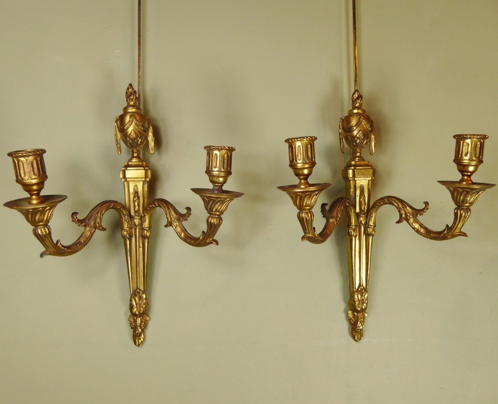 PAIR OF GILT BRASS WALL SCONCES