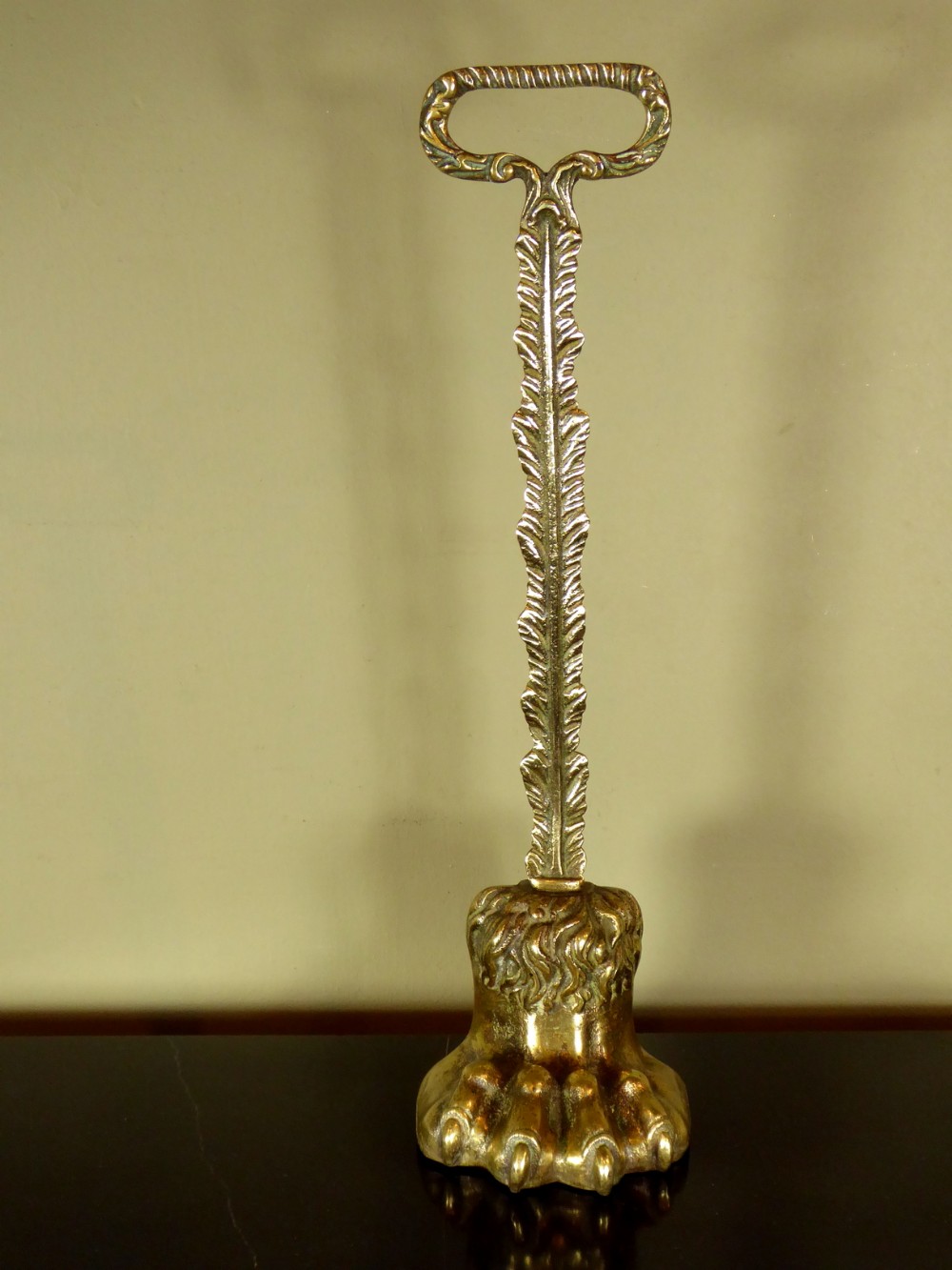 19TH C BRASS LIONS PAW DOOR STOP