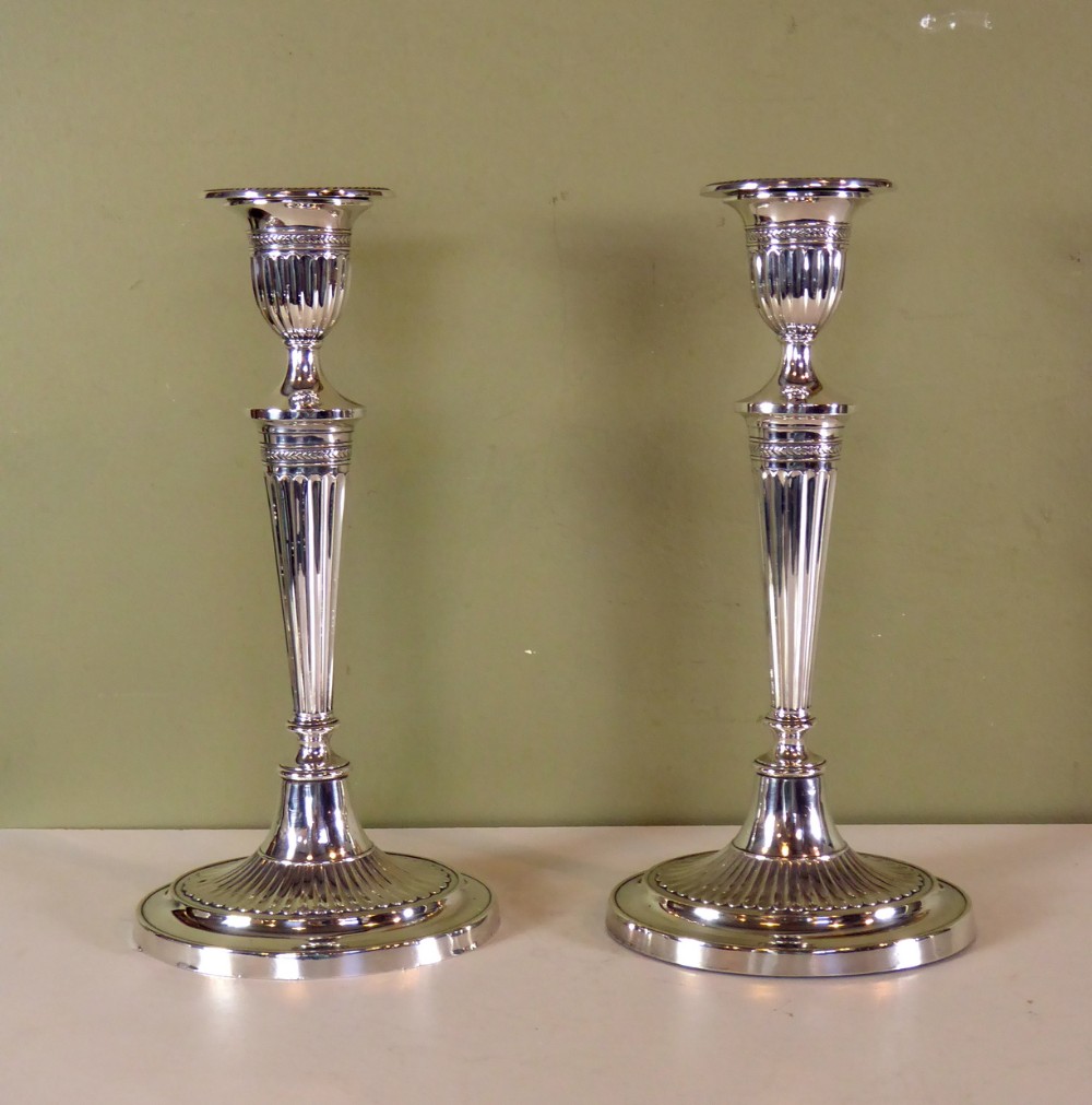 PAIR OF SILVER CANDLESTICKS