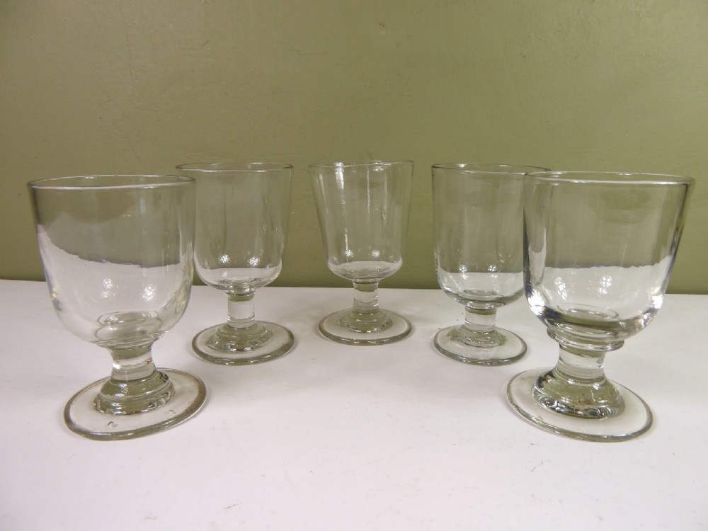 FIVE EARLY 19TH C GLASS RUMMERS