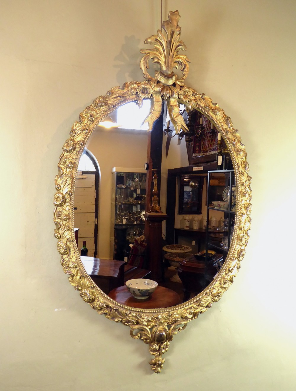 19TH C GILT BRASS OVAL MIRROR