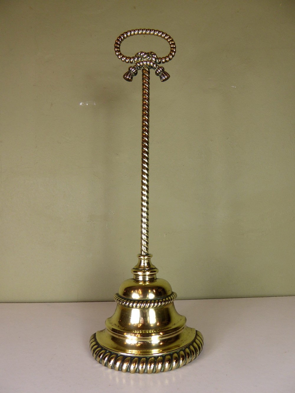 19TH C BRASS DOOR STOP