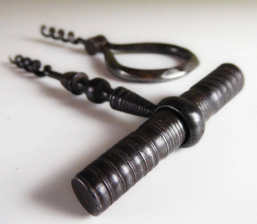 TWO EARLY 19TH C STEEL CORK SCREWS