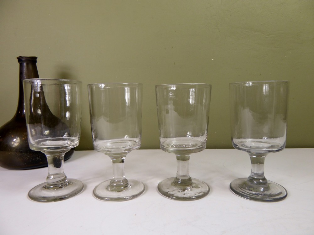 SET OF FOUR GLASS RUMMERS
