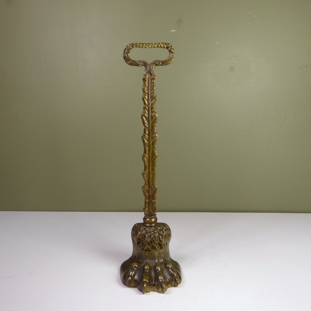 19TH C LIONS PAW BRASS DOOR PORTER
