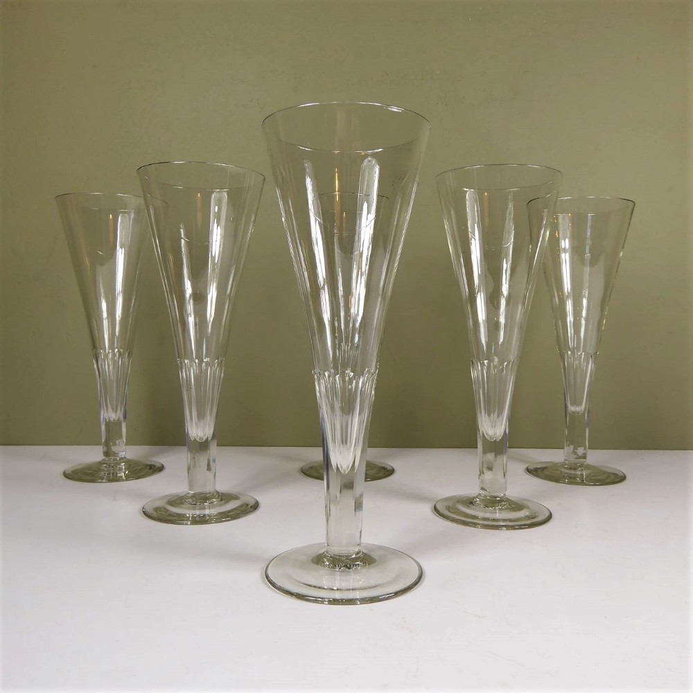 A SET OF SIX LARGE GLASSES