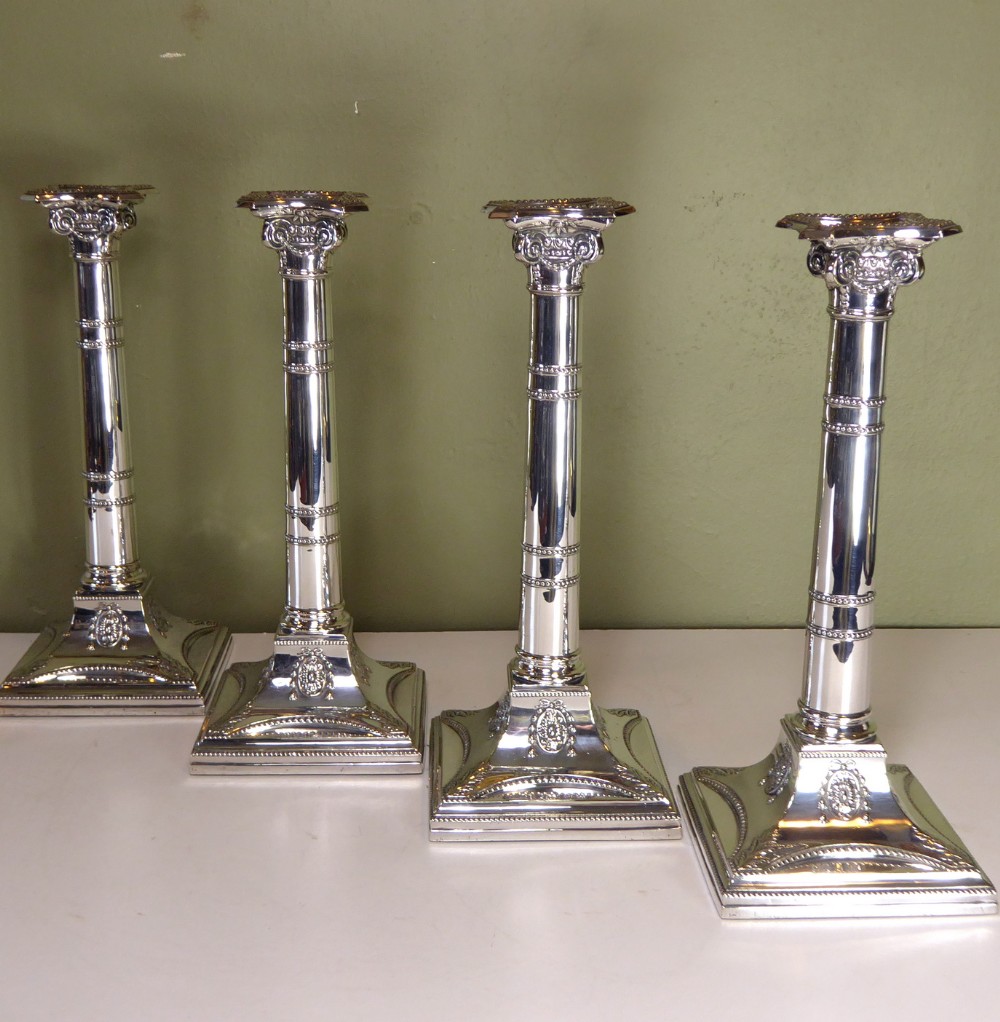 SET OF FOUR SILVER PLATED CANDLESTICKS 1866
