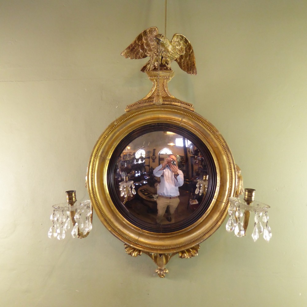 REGENCY GILT CONVEX MIRROR WITH CANDLE ARMS