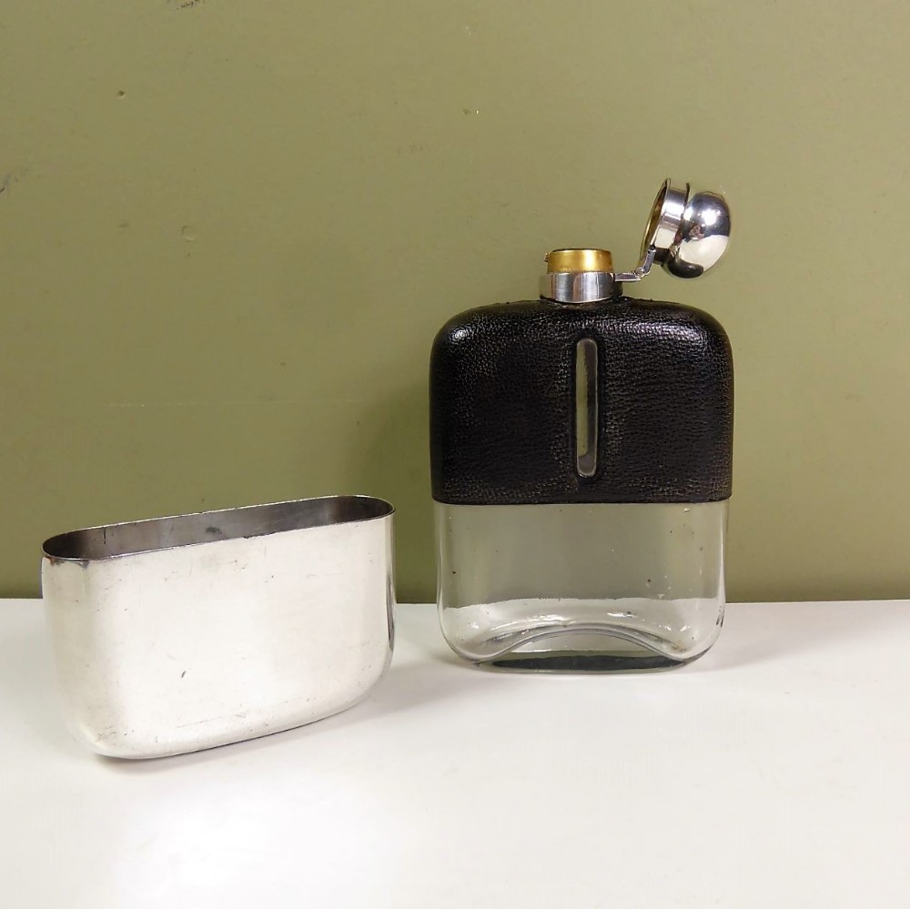 A LARGE HIP FLASK