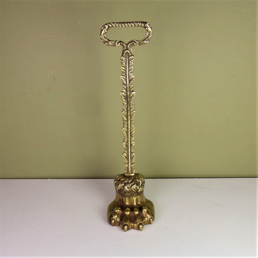 19TH C BRASS LIONS PAW DOOR PORTER