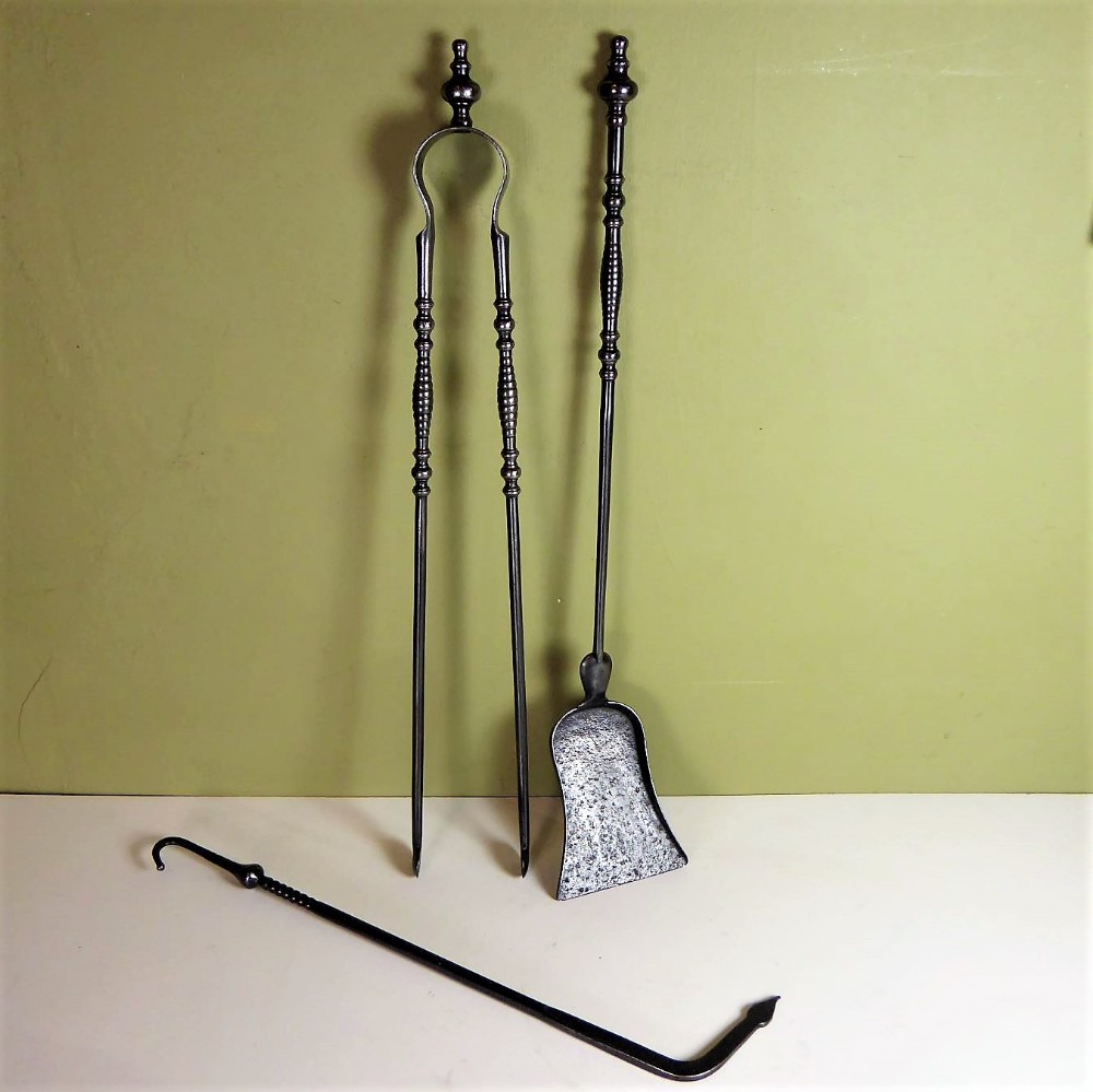 A SET OF FIRE TOOLS 